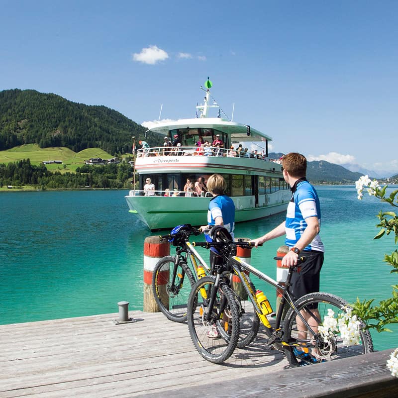 Schifffahrt am Weißensee mit Mountainbike